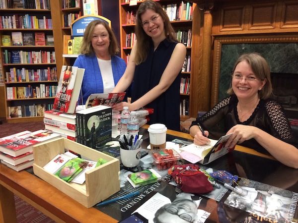 Kim at signing table