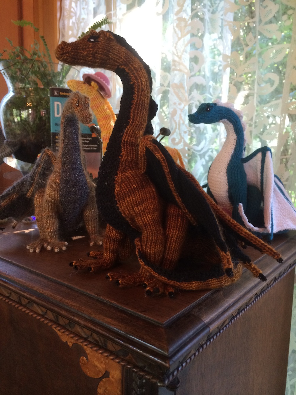 three reclining dragons